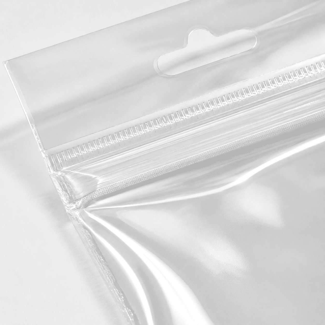 Pungi cu agățătoare și clapetă adezivă - transparent (set 1000 buc) - CraftUp